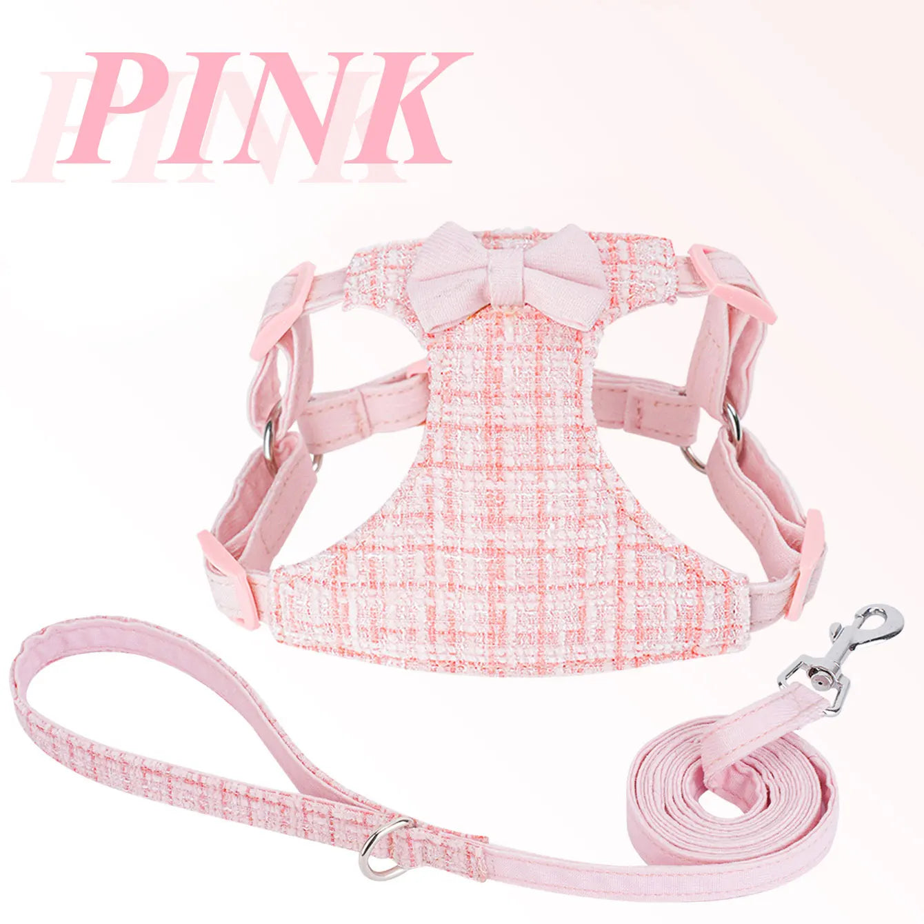 Harnais et laisse rose sur fond blanc avec un texte « PINK ».

